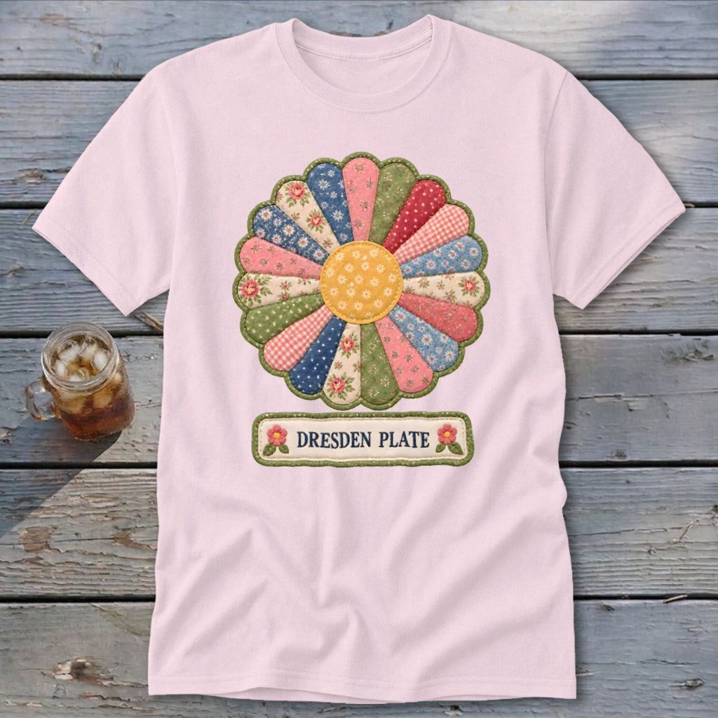 Pink t-shirt with a colorful Dresden Plate flower graphic and text.