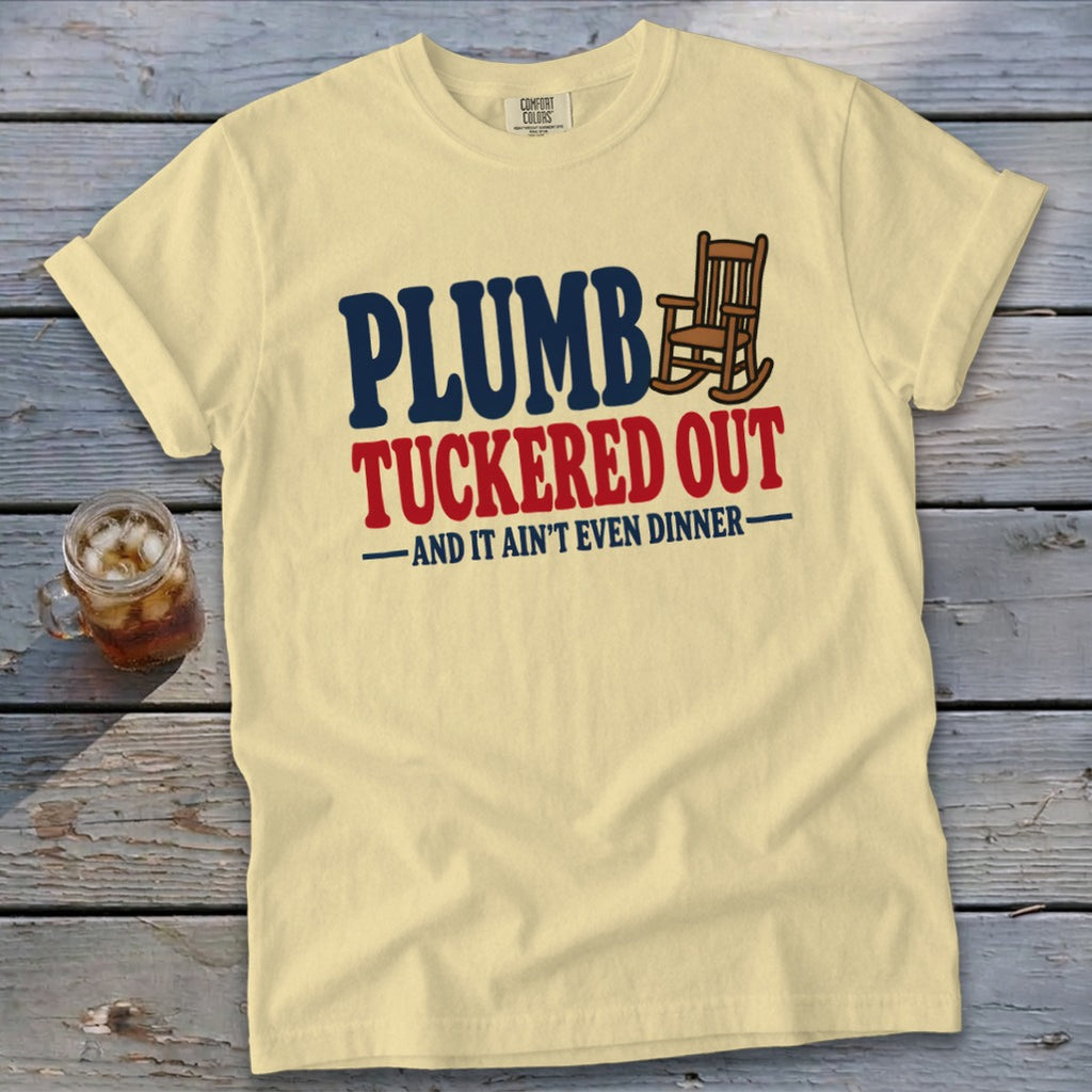 Yellow t-shirt with "PLUMB TUCKERED OUT AND IT AIN'T EVEN DINNER" text.