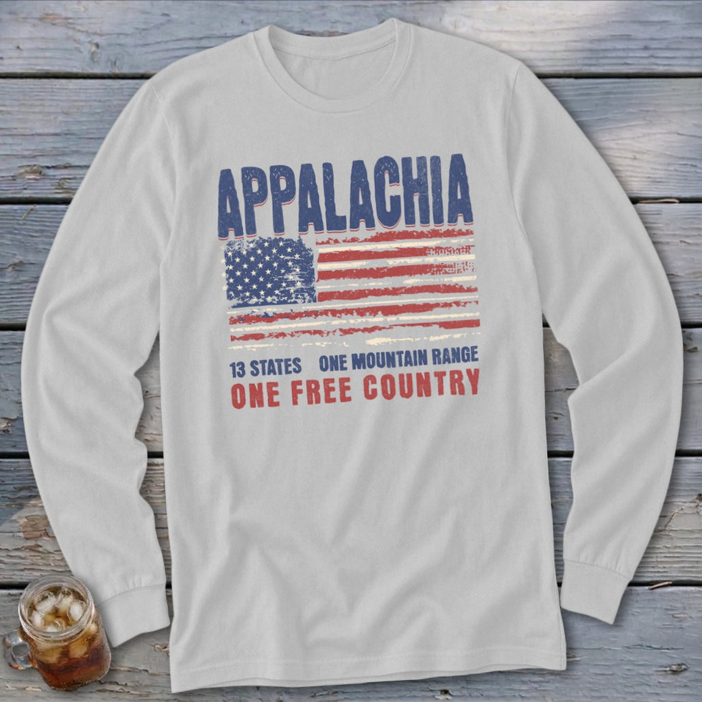Light gray long-sleeve t-shirt with a distressed graphic featuring the American flag and text that reads Appalachia, 13 States, One Mountain Range, One Free Country.