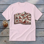 Light pink short-sleeved t-shirt featuring a red and grey graphic of a mountainous landscape with quilts.