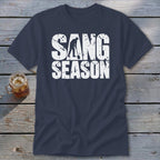 Dark blue t-shirt featuring distressed white text that reads SANG SEASON with a silhouetted digger.