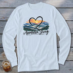 Light blue long-sleeve shirt with a watercolor heart over mountains and "Appalachia Strong" text.