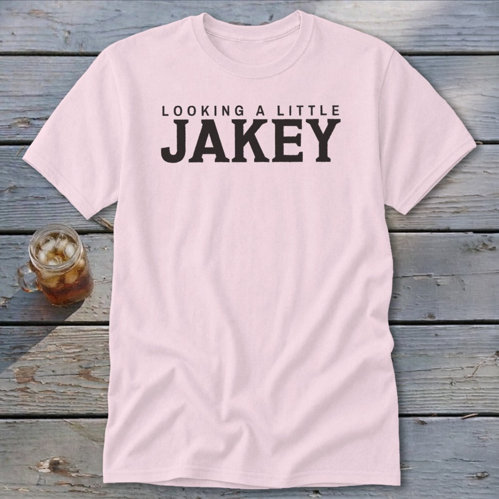 Pink t-shirt with black text reading "Looking A Little Jakey."