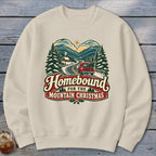 Sweatshirt with "Homebound for the Mountain Christmas" graphic featuring a red truck and snowy landscape.
