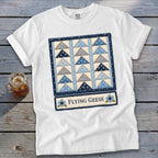 White t-shirt with "Flying Geese" quilt pattern and text graphic.
