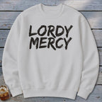 White crewneck sweatshirt with "LORY MERCY" in black brushstroke text.