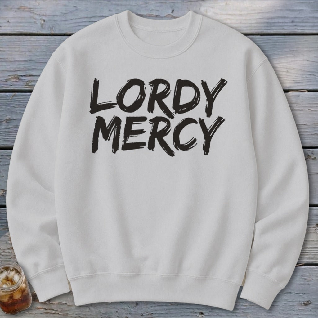 White crewneck sweatshirt with "LORY MERCY" in black brushstroke text.