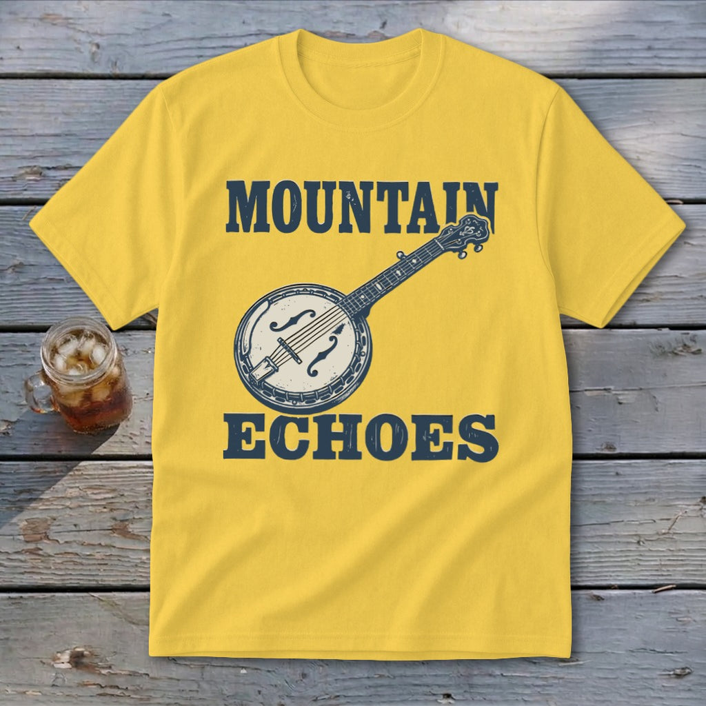 A yellow t-shirt with a vintage banjo graphic and the text MOUNTAIN ECHOES resting on a wooden surface.