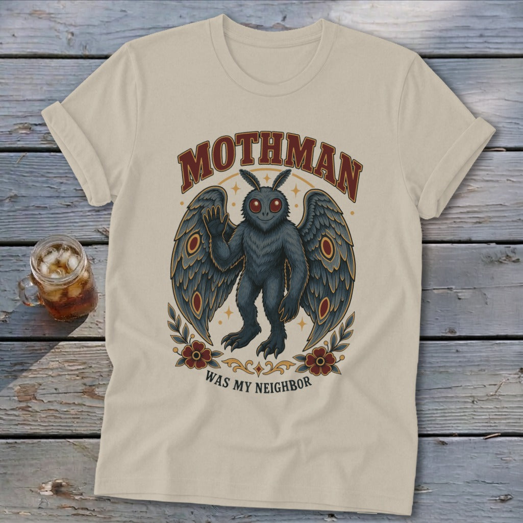 Cream t-shirt with Mothman graphic and text "Mothman Was My Neighbor".