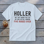 White t-shirt with "HOLLER NOT JUST WHERE YOU LIVE BUT HOW YOU CALL SOMEONE FIVE RIDGES OVER" text.