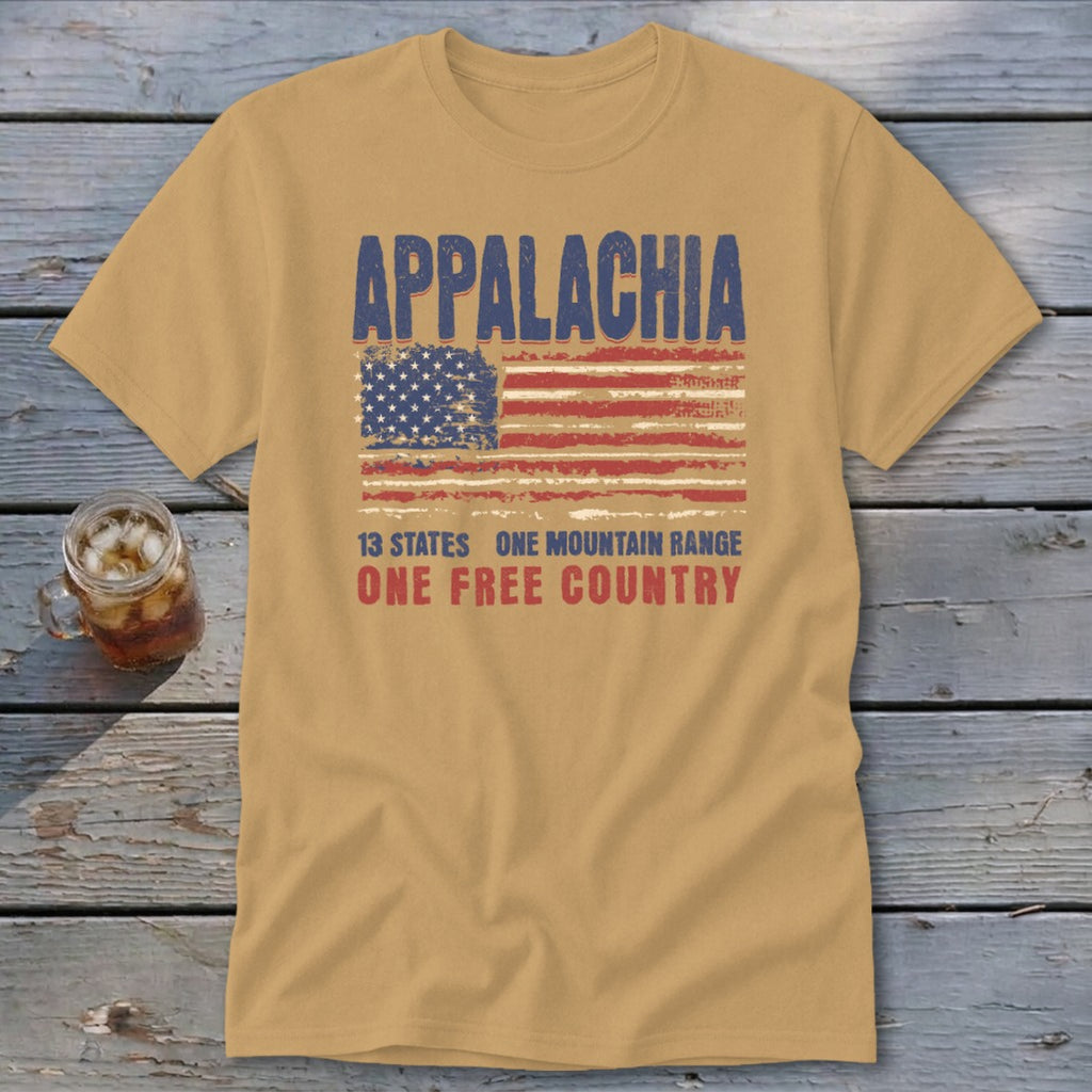 Tan short-sleeved crewneck t-shirt featuring a distressed American flag graphic with the text Appalachia, 13 States, One Mountain Range, One Free Country.