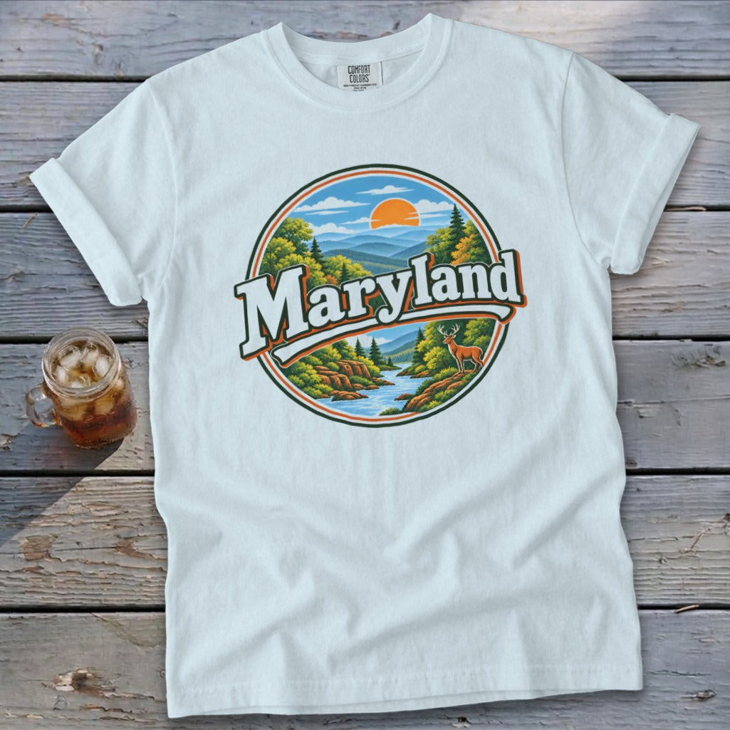 White t-shirt with circular Maryland nature graphic featuring a deer and river.
