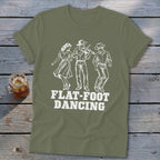 Olive green t-shirt with white flat-foot dancing graphic and text.