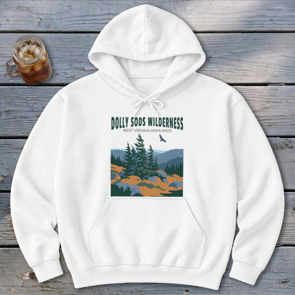 A white hooded sweatshirt features a graphic of the Dolly Sods Wilderness with evergreen trees and a bird.