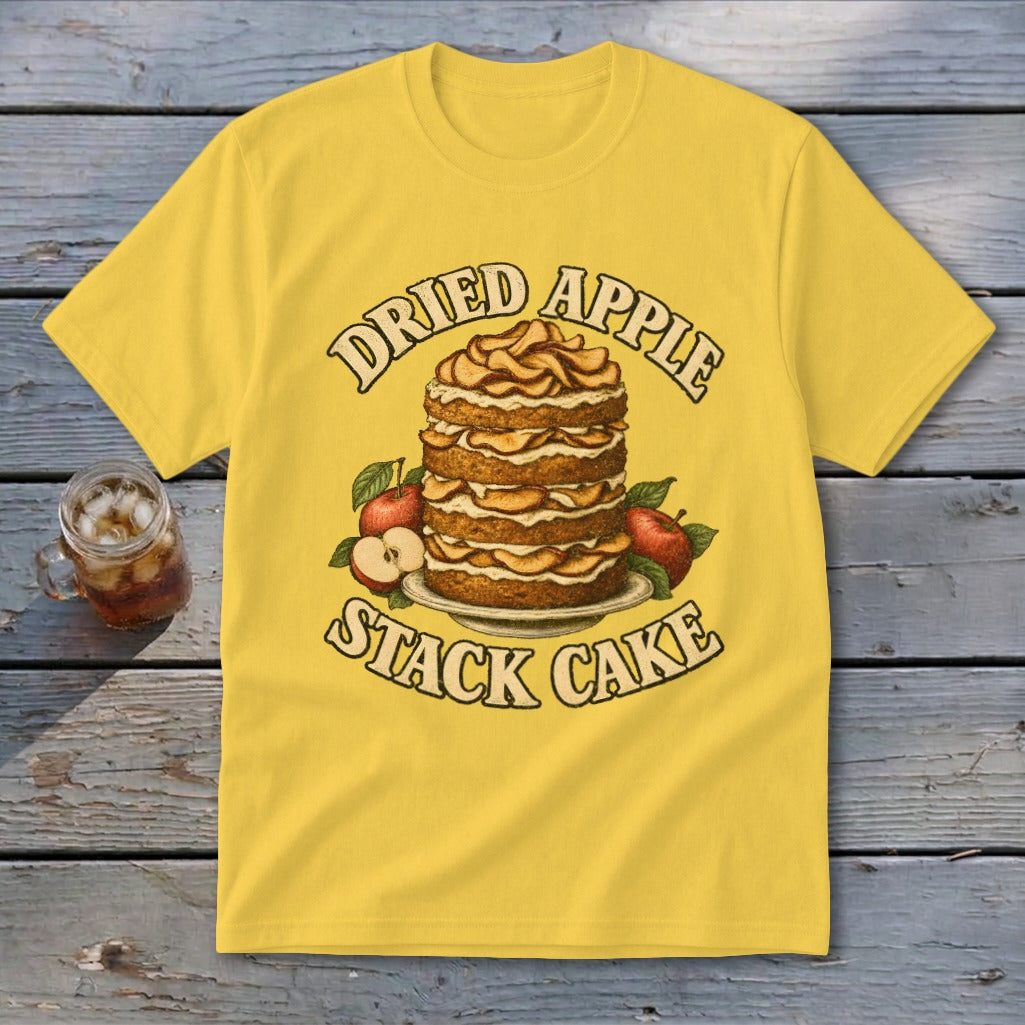Yellow t-shirt graphic featuring a stack cake with apples and text "Dried Apple Stack Cake."