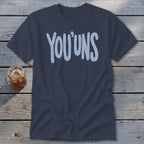 Navy t-shirt with light blue "YOU'UNS" text and a glass of iced tea.