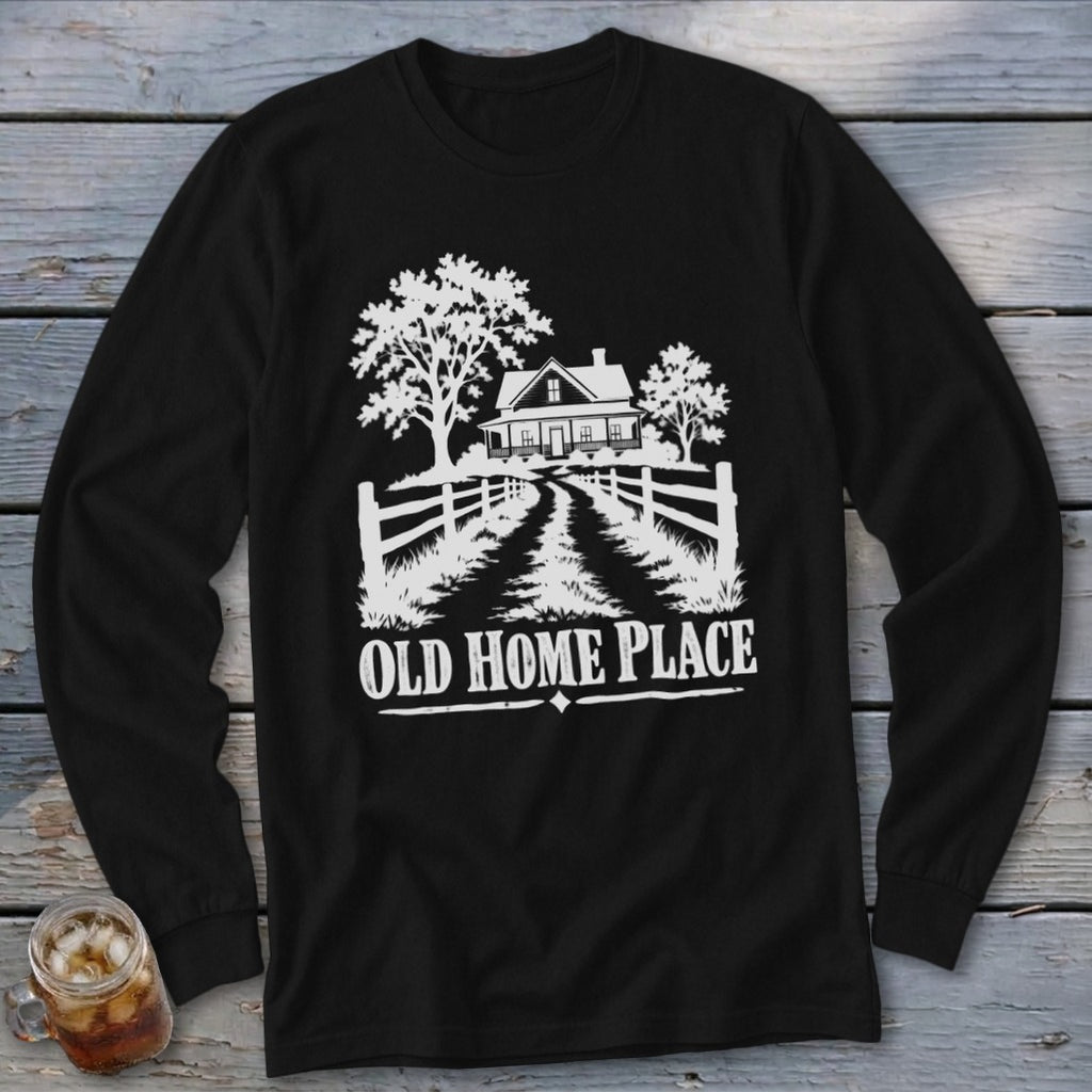 Black long-sleeve shirt with white graphic of a farmhouse, trees, and the words "OLD HOME PLACE".