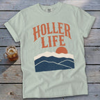 Lightweight t-shirt with "Holler Life" text and mountain graphic.