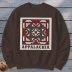 Brown crewneck sweatshirt featuring a square geometric patchwork design and the word Appalachia below.