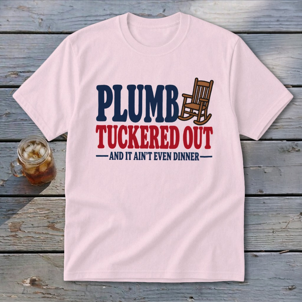 Pink t-shirt with "PLUMB TUCKered OUT AND IT AIN'T EVEN DINNER" text and rocking chair icon.