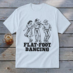 White t-shirt with black graphic of three people dancing and text "FLAT-FOOT DANCING".