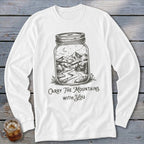 White long-sleeve t-shirt featuring a mason jar graphic containing a mountain landscape and the text Carry The Mountains With You.