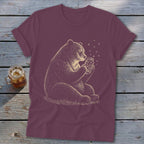 Bear holding a mason jar filled with stars, with tiny stars floating around it.