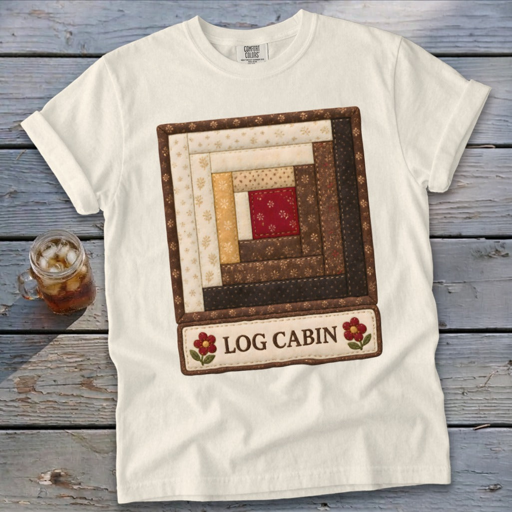 Cream t-shirt with a quilt-style "Log Cabin" graphic and red flowers.