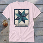 Pink t-shirt with an eight-pointed star quilt block design and text.