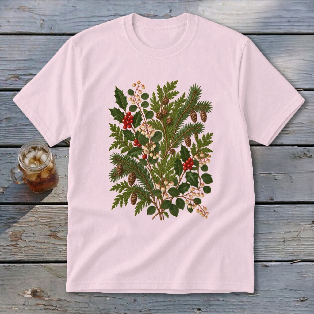 Light pink t-shirt with a detailed botanical illustration of pine, holly, and berries.