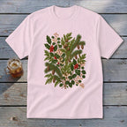 Light pink t-shirt with a detailed botanical illustration of pine, holly, and berries.