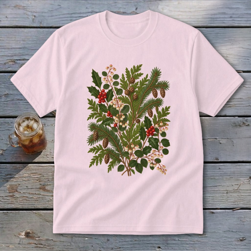 Light pink t-shirt with a detailed botanical illustration of pine, holly, and berries.