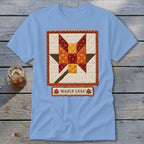 Light blue t-shirt with a quilted maple leaf design and "Maple Leaf" text label.