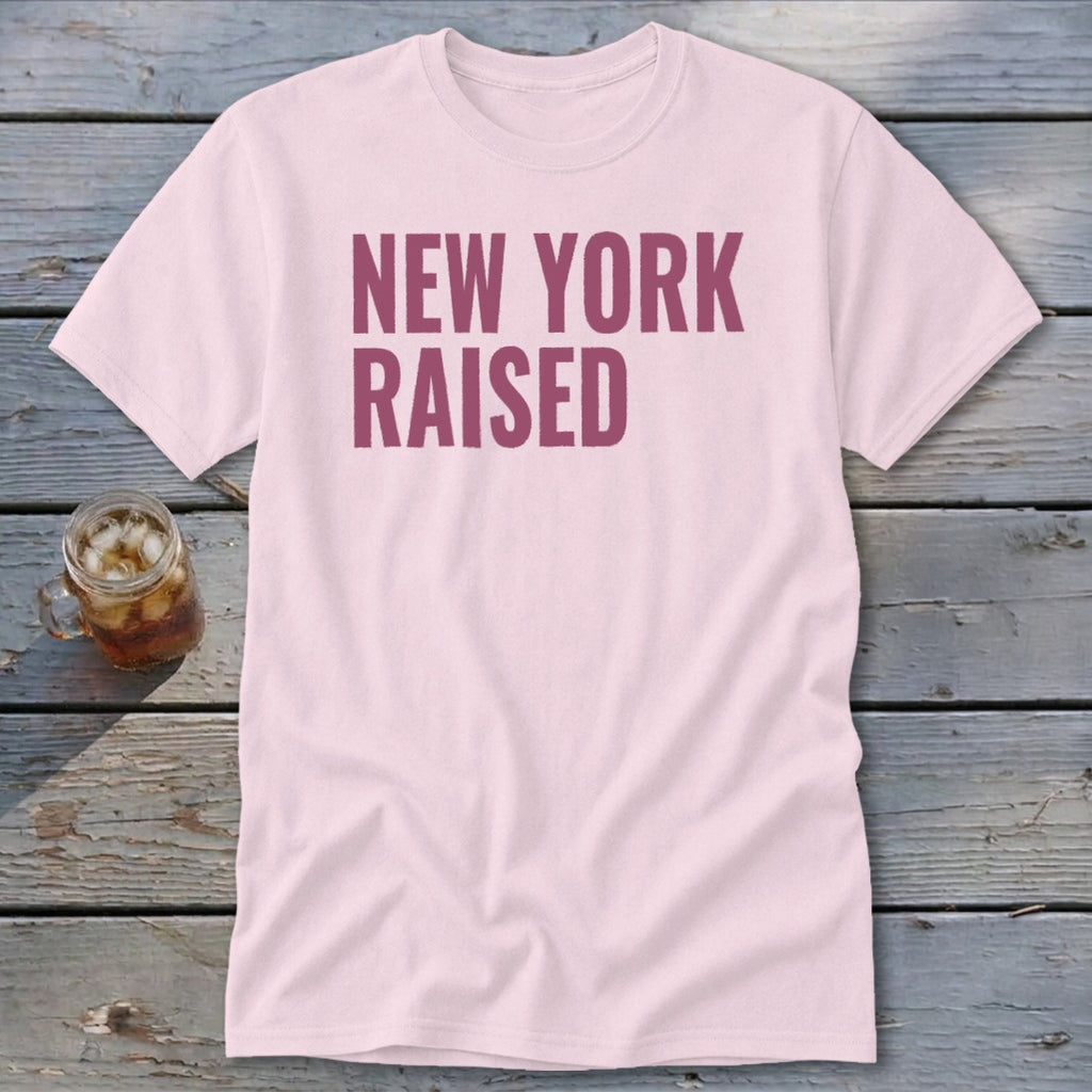 Light pink t-shirt with "NEW YORK RAISED" in burgundy text.