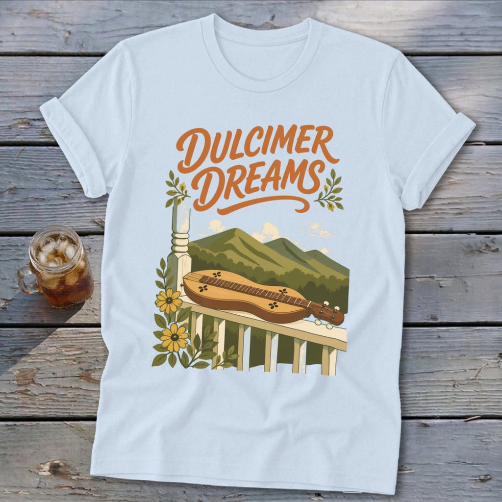 Light blue t-shirt with "Dulcimer Dreams" text and dulcimer on a railing.