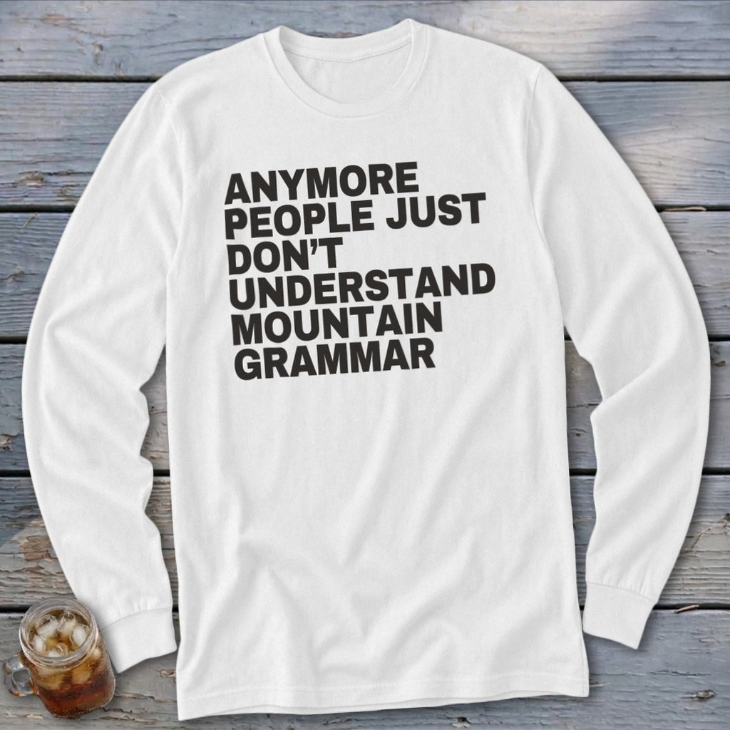 White long-sleeve shirt with black text: "Anymore people just don't understand mountain grammar".