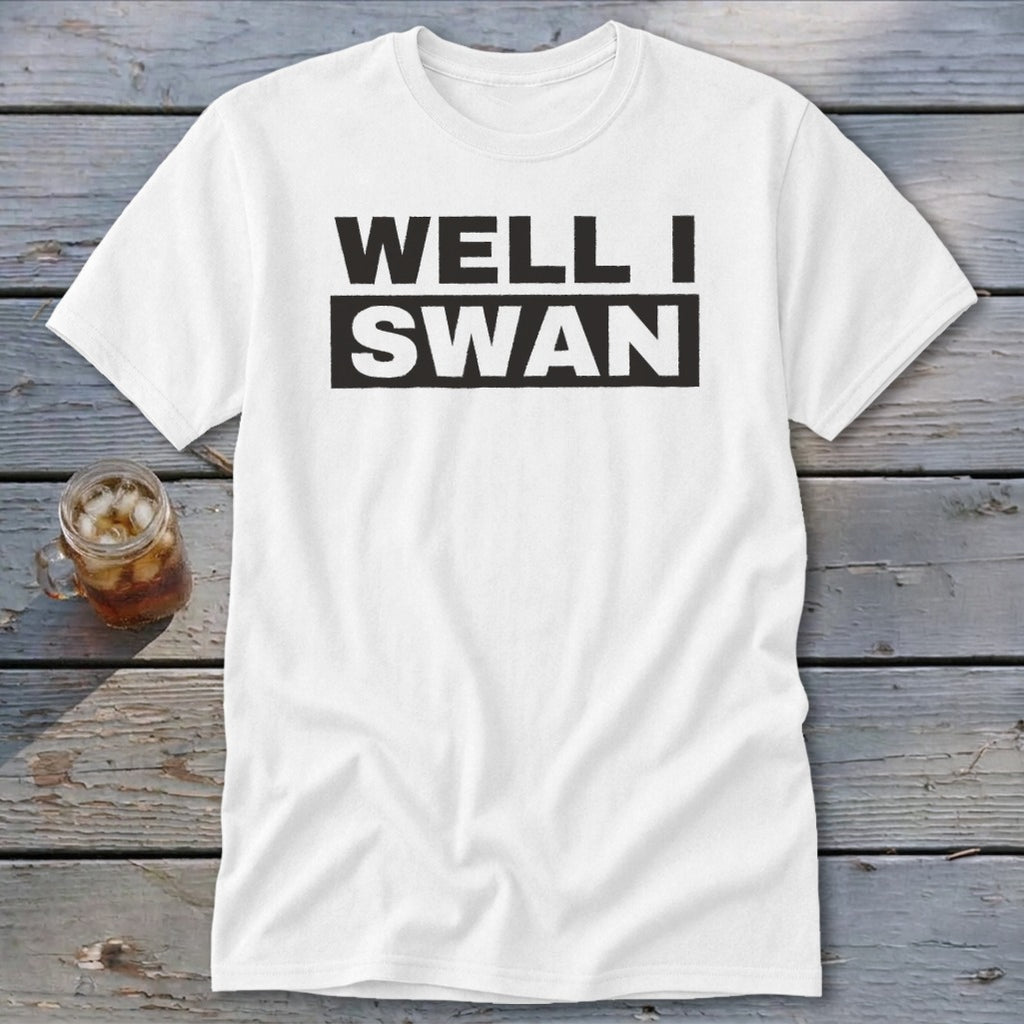A white t-shirt with the bold black text WELL I SWAN displayed across the chest.