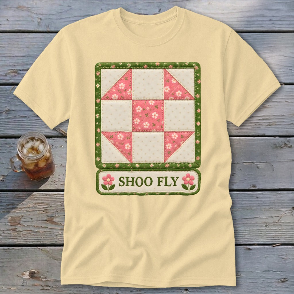 Pale yellow t-shirt with a quilted Shoo Fly block and floral border design.