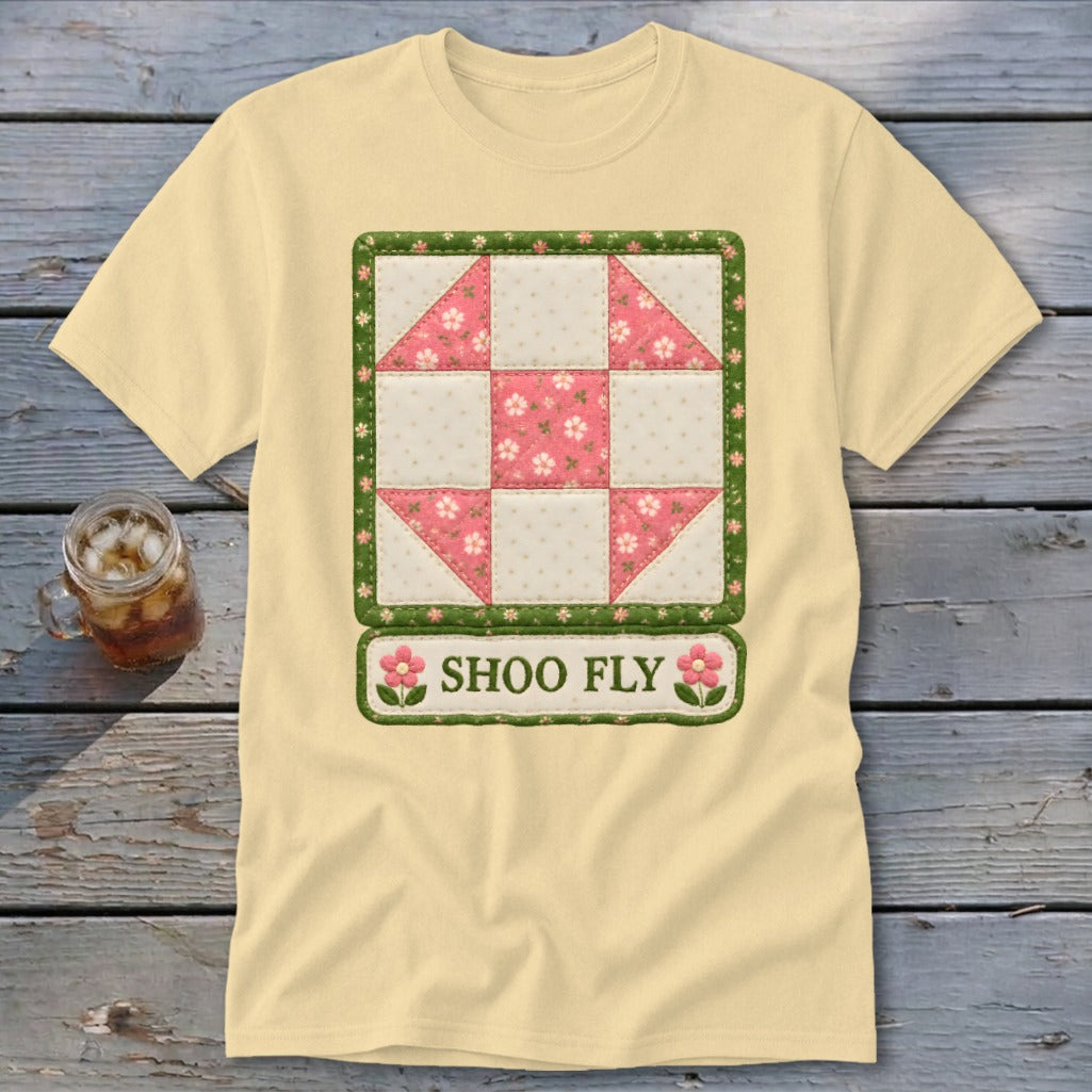 Pale yellow t-shirt with a quilted Shoo Fly block and floral border design.
