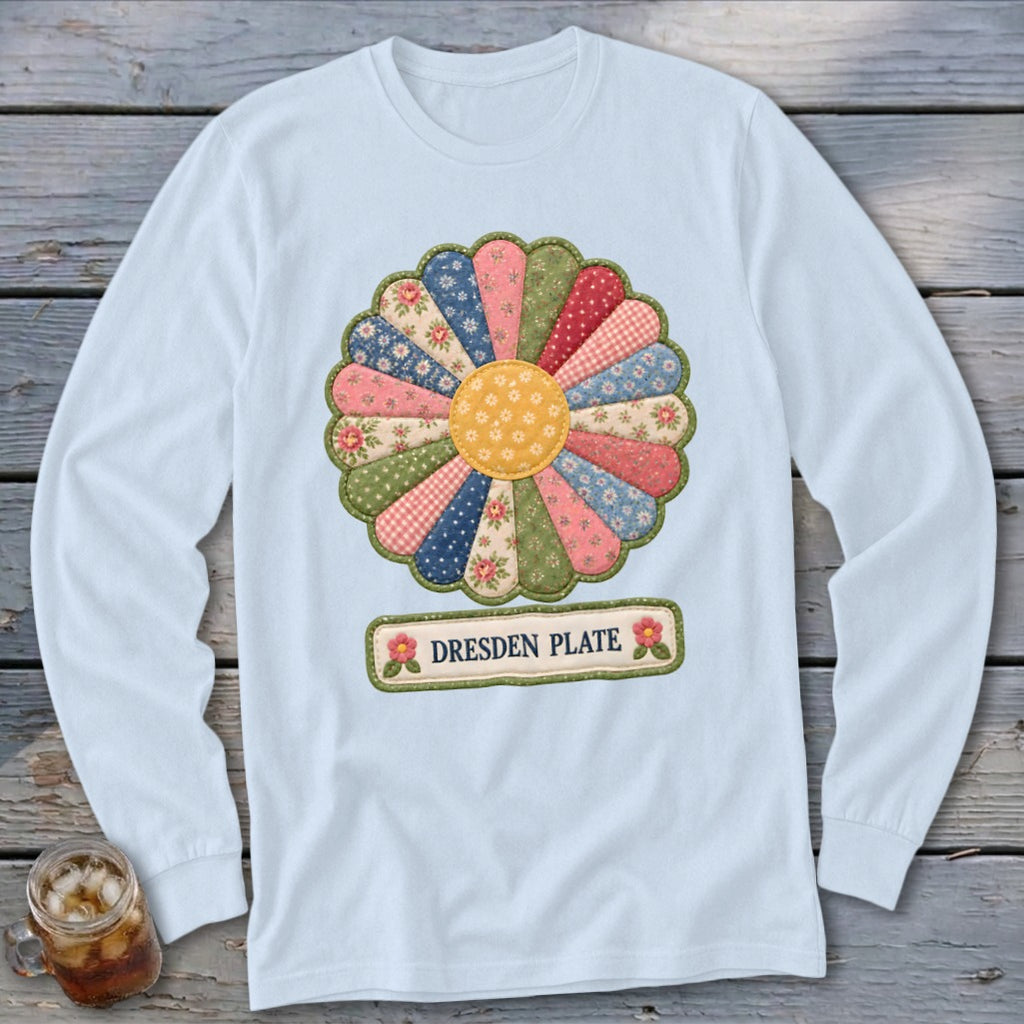 Light blue long-sleeve shirt featuring a colorful Dresden Plate quilt pattern and text.