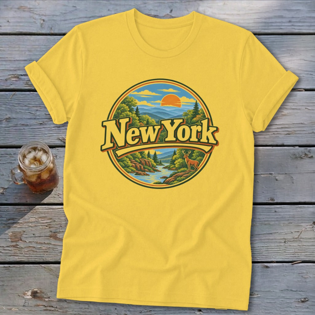 Yellow t-shirt with a circular New York landscape graphic and a deer.