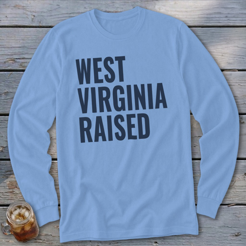Light blue long sleeve t-shirt with dark blue text "WEST VIRGINIA RAISED".