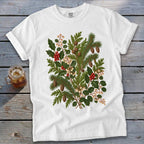 White t-shirt with a botanical print of pine sprigs, holly, and berries.