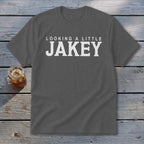 Dark grey t-shirt with white text: "LOOKING A LITTLE JAKEY".