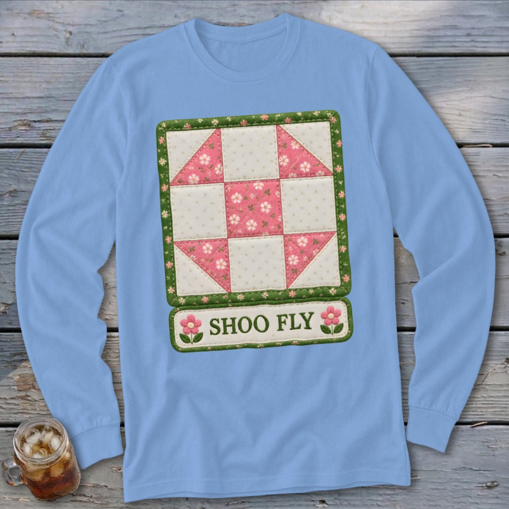 Light blue long-sleeve shirt with a Shoo Fly quilt block design and text.