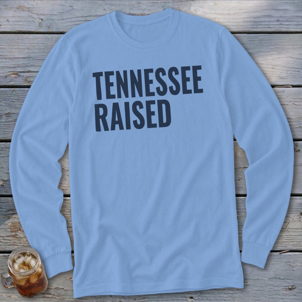 Light blue long sleeve shirt with "TENNESSEE RAISED" in navy blue text.