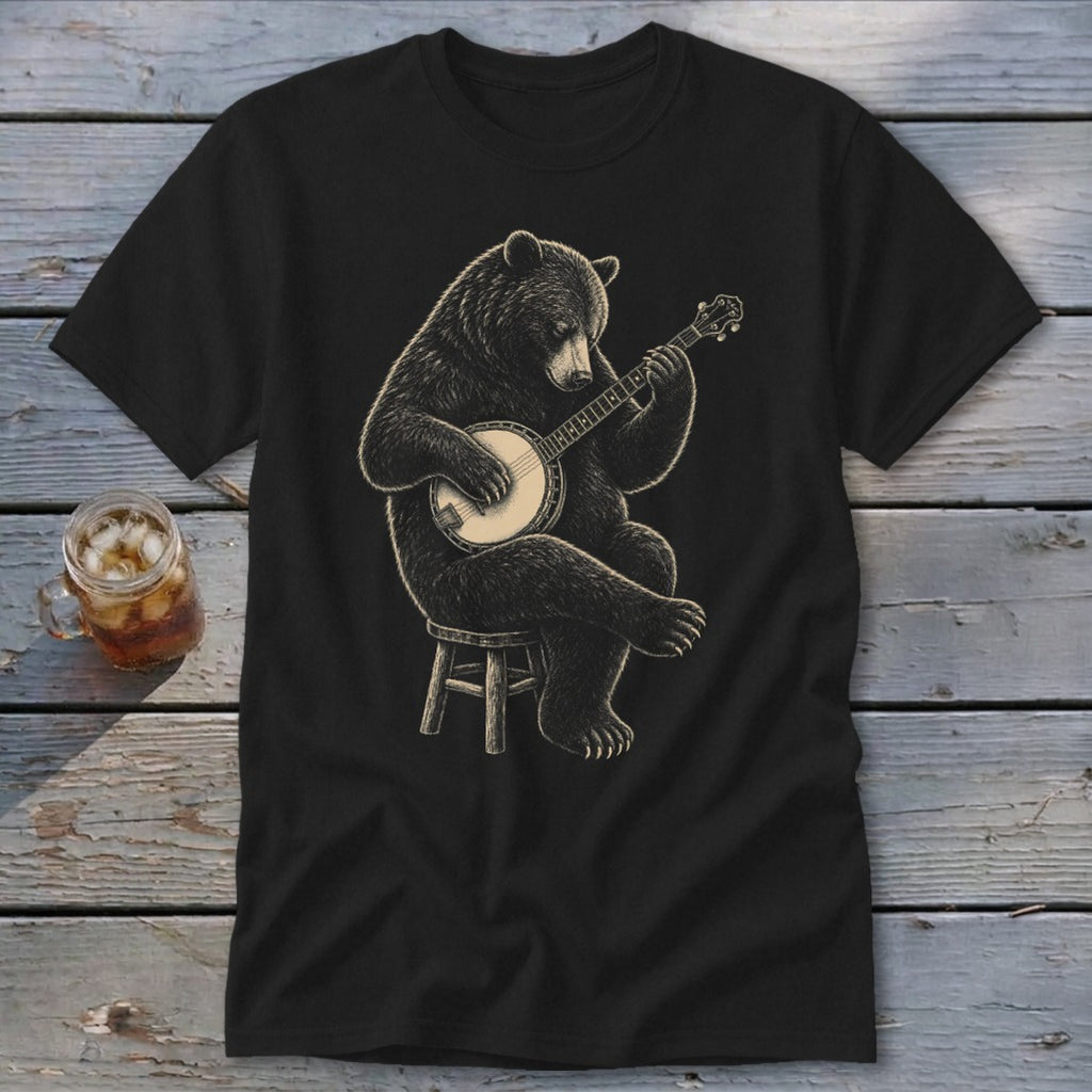 Black t-shirt with a detailed illustration of a bear playing a banjo on a stool.