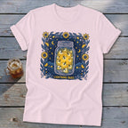 Pink t-shirt featuring a jar filled with lightning bugs against a starry night sky.