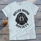 White t-shirt with black text and dog illustration reading "Holler Hound Society".