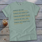 T-shirt with text listing "Things We Did," "Things We Didn't Do," etc.